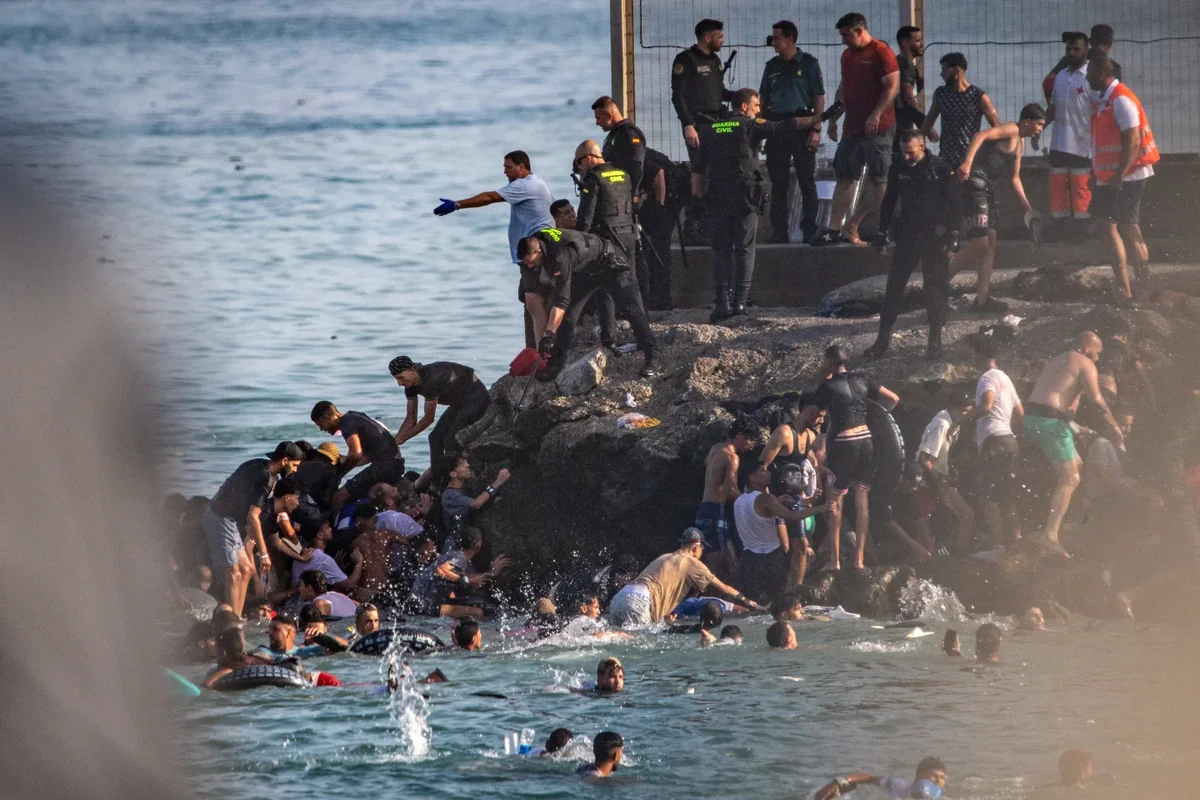 Morocco! 2026 Young people split, Spain’s spy agency warned of Ceuta, migration irrégulière vers Ceuta et Melilla, Saad Lamjarred condamné, Affaire Abderrahim Fakir, Le procès du rappeur Hamza Raid, 300 migrants Spain’s Ceuta, died in the Ceuta migrant surge, Affaire Abderrahim Fakir: le consulat du Maroc à Bologne assure un suivi rapproché du dossier judiciaire, Preliminary autopsy points to possible asphyxiation in death of Moroccan national in Italy, Au Maroc les soutiens du rappeur Mehdi Black Wind réclament sa libération, Sécurité routière : Plus de 160.000 accidents et 4.577 décès en 2025, Youssef 8 ans mort électrocuté à Aïn Diab : les zones d’ombre d’un drame évitable, Affaire Mehdi Black Wind: report de l’audience au 31 juillet, Marrakech et Tanger : 11 personnes interpellées lors d’opérations sécuritaires conjointes avec Interpol, Affaire du chauffeur inDrive tué : le récit d’un drame qui a secoué Sidi Taïbi, 4126 حالة غش في امتحانات البكالوريا والوزارة تتوعد المخالفين , توقيف 11 شخصا من مزدوجي الجنسية يشكلون موضوع مذكرات بحث وطنية وأخرى دولية , أمن وجدة يوقف شاباً ظهر في “فيديو” يهدد سلامة المواطنين بسلاح أبيض, إحباط محاولة تهريب 19 ألفا و100 قرص مهلوس بميناء طنجة المتوسط, Mdiq : Arrestation d’un individu extrémiste soupçonné de préparer un projet terroriste visant à porter gravement atteinte à la sécurité des personnes et à l’ordre public (Bureau central d’investigations judiciaires), Barcelone : Un commando cagoulé attaque la boutique « AURA The Club » du marocain Ash Zaim et dérobe pour plus de 40.000 euros d’articles de luxe, Affaire du chien sacrifié : Ben Nesnes poursuivi en état de détention, BCIJ : Interpellation à Dakhla d’un extrémiste affilié à l’organisation dite “État islamique”, Une influenceuse écossaise disparaît mystérieusement à Agadir, Taroudant : interpellation d’un individu pour vol avec coups et blessures ayant entrainé la mort d’un ressortissant étranger, Criminalité – Meurtre d’un chauffeur InDrive à Casablanca : six suspects écroués trois poursuivis en liberté, Scandale – Marrakech : lourdes peines de prison dans l’affaire de « vente de diplômes de master » à Agadir, Le bad buzzeur « Ben Nsns » arrêté après la polémique du chien abattu et mangé pour l’Aïd, Décès de l’individu qui s’est défenestré à la BNPJ de Casablanca: Les multiples lésions sont compatibles avec une chute préméditée, Affaire Ziane – La Cour d’appel de Rabat rouvre le dossier mardi prochain après cassation, Marrakech: lourdes peines contre 48 accusés pour les troubles liés aux manifestations de la “Gen Z”, Casablanca : enquête ouverte après le décès de deux jeunes footballeuses percutées par un train, Fraude bancaire à Sidi Slimane : une affaire qui relance le débat sur la cybersécurité, Casablanca : un Algéro-français interdit de quitter le Maroc après la diffusion d’une vidéo offensante, Affaire du café La Crème: confirmation de la peine de mort pour deux accusés, Il a sévi au Maroc: un septuagénaire écroué en France pour viols et agressions sexuelles sur 89 mineurs